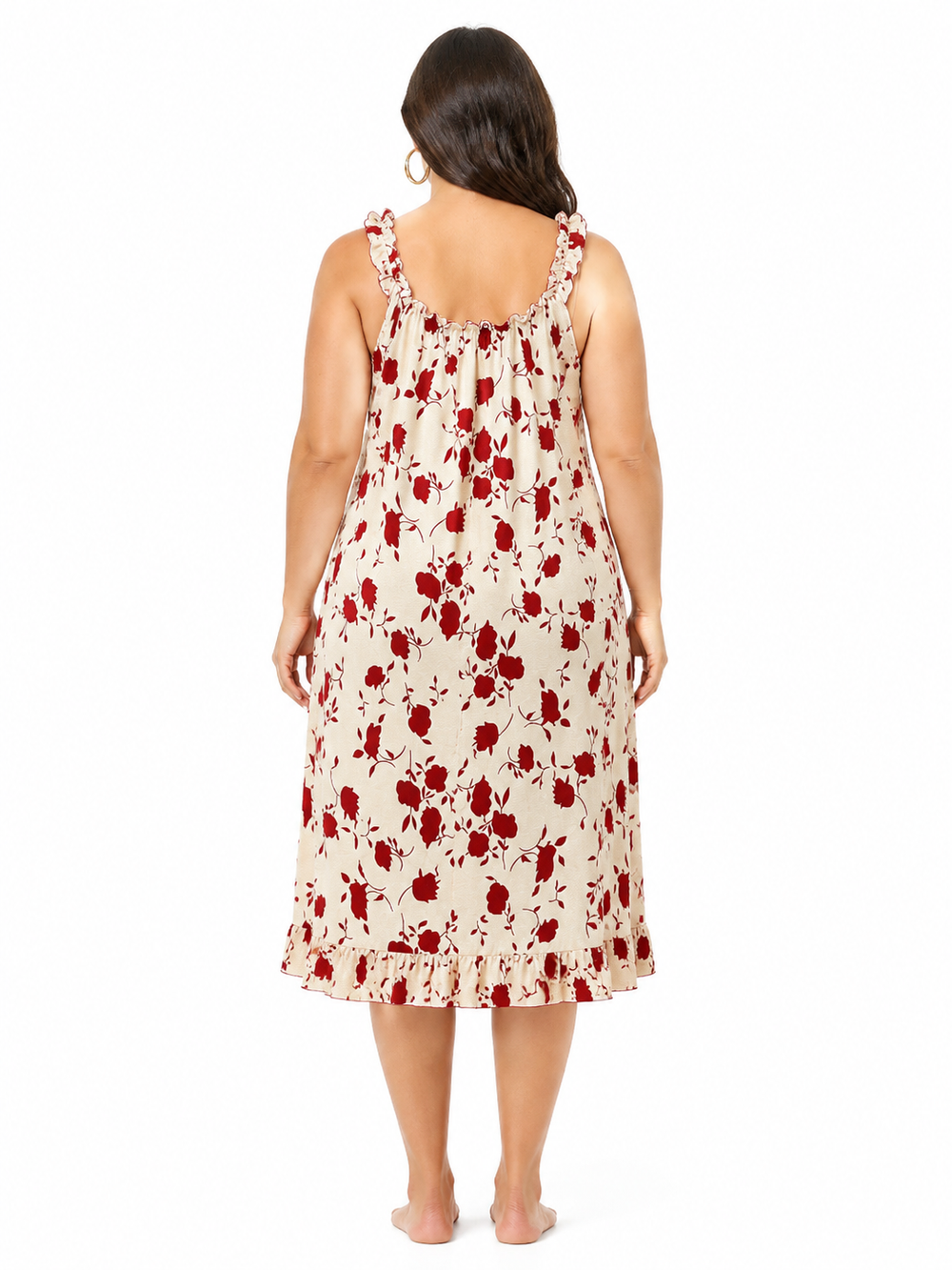 Back view of a plus size woman wearing a cream and red floral print nightgown