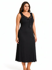 Close-up of the lace neckline and bow on a black nightgown