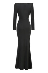Back view of a long black formal dress with a fitted silhouette and a mermaid hem.