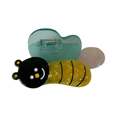 A single bee-shaped hair clip with translucent blue wings and a yellow striped body.