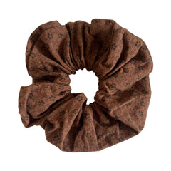 brown scrunchie with a floral pattern