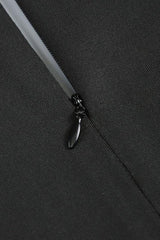 Close-up of a black zipper closure on a formal dress.