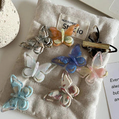 collection of assorted translucent butterfly hair clips