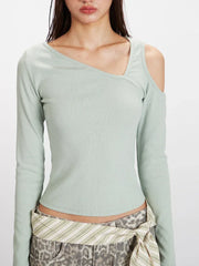 Front view focusing on the neckline and upper torso of the mint green long-sleeved shirt with its unique asymmetrical design.