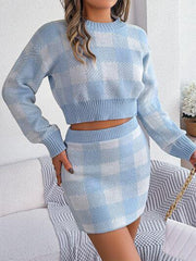 Woman wearing a light blue and white gingham check knit cropped sweater and mini skirt set, showing front detail