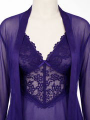 Close-up of the purple lace bralette with a bow detail, worn under a sheer robe.