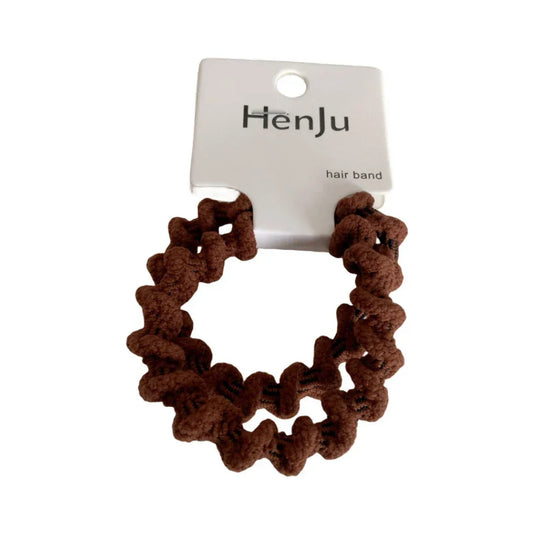 Brown spiral hair tie with Henju branding