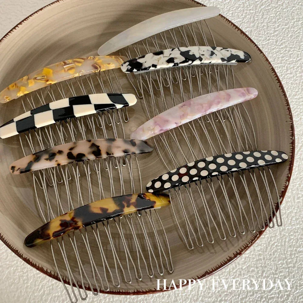 Assortment of decorative hair combs in various patterns
