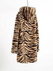 Back view of a hooded faux fur tiger print long coat hanging on a hanger.