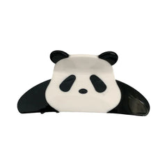 A black and white panda hair claw clip