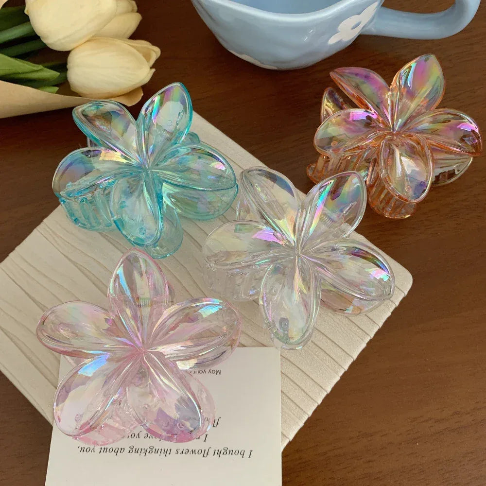assortment of colored iridescent flower claw hair clips