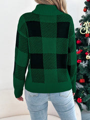 Back view of a woman in a green and black buffalo plaid turtleneck sweater