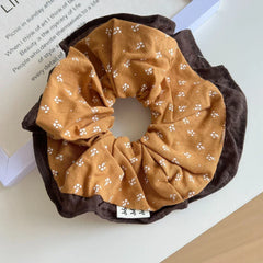 Large floral lace scrunchie with ruffled edges and eyelet trim - View 9 | TEVQA