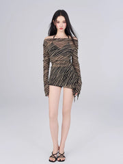 Full body shot of the model in the sheer striped cover-up and bikini