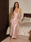 Front view of a woman wearing a pink satin and lace maxi nightdress