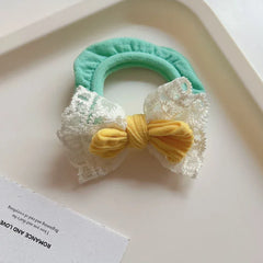 Dainty lace bow scrunchie with terry cloth base - View 9 | TEVQA