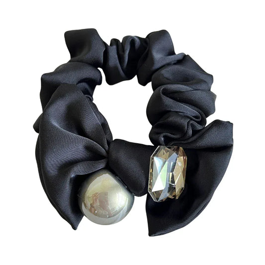 Black satin scrunchie with a metallic sphere and crystal embellishment