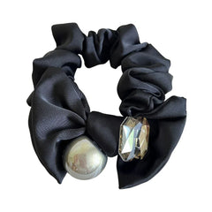 Black satin scrunchie with a metallic sphere and crystal embellishment
