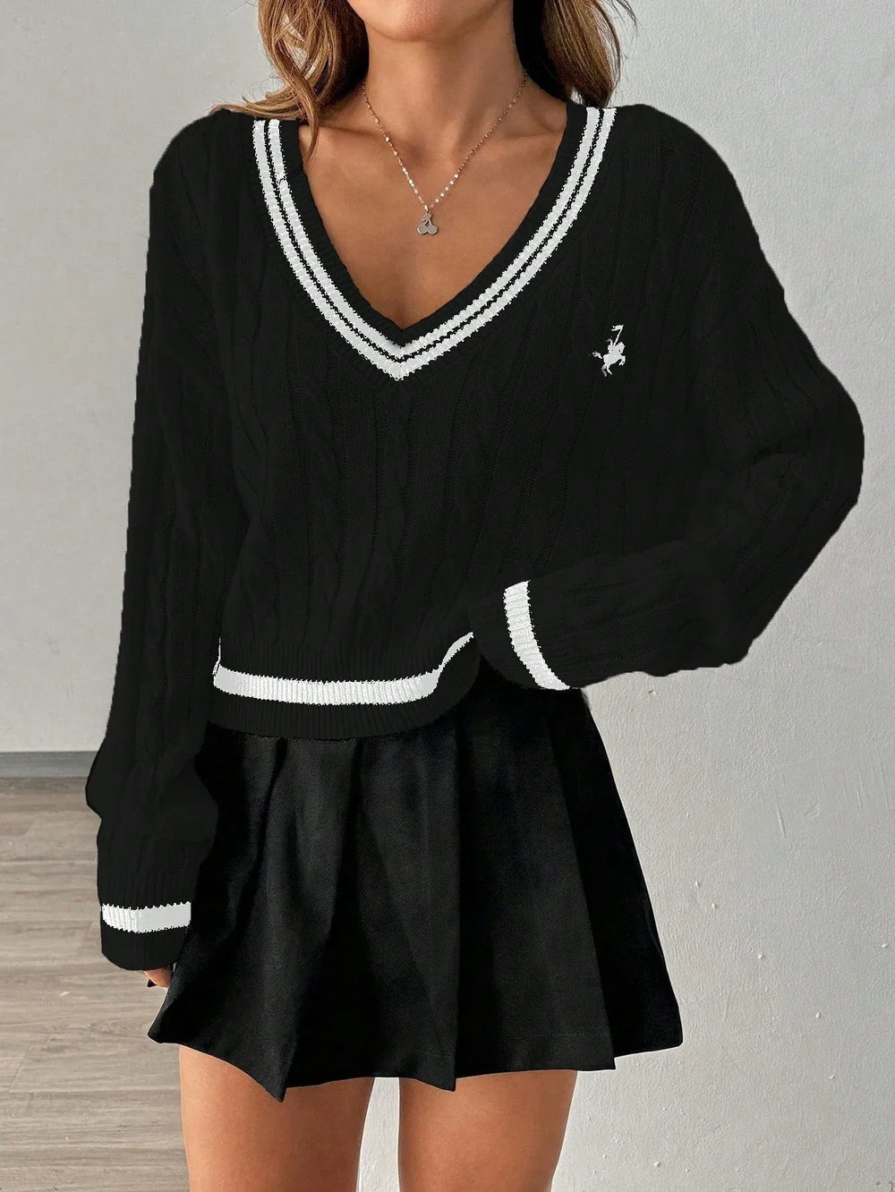 White cable knit V-neck sweater with black trim and embroidered crest - View 8 | TEVQA