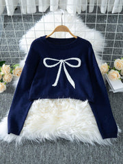 Navy cropped sweater with a white bow graphic print, displayed on a hanger.