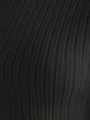 Close-up of the ribbed texture of the black knit fabric of the long-sleeve top.