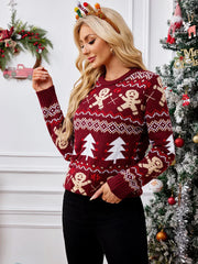 Close-up of a woman in a red Christmas sweater with a holiday pattern, looking to the side.