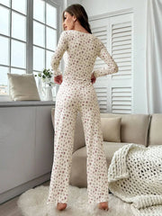 Back view of a woman in a floral print pajama set