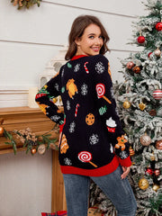 Back view of a woman wearing a black Christmas sweater with various Christmas food and candy graphics