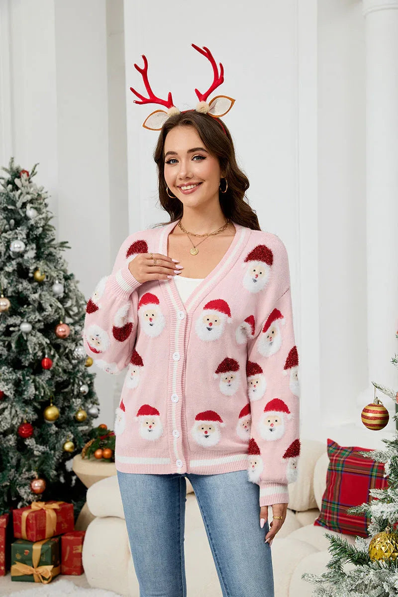 Woman wearing a pink Santa Claus print knit cardigan and reindeer antlers