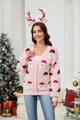 Woman wearing a pink Santa Claus print knit cardigan and reindeer antlers