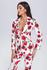 Close-up of a woman wearing a white floral print blazer