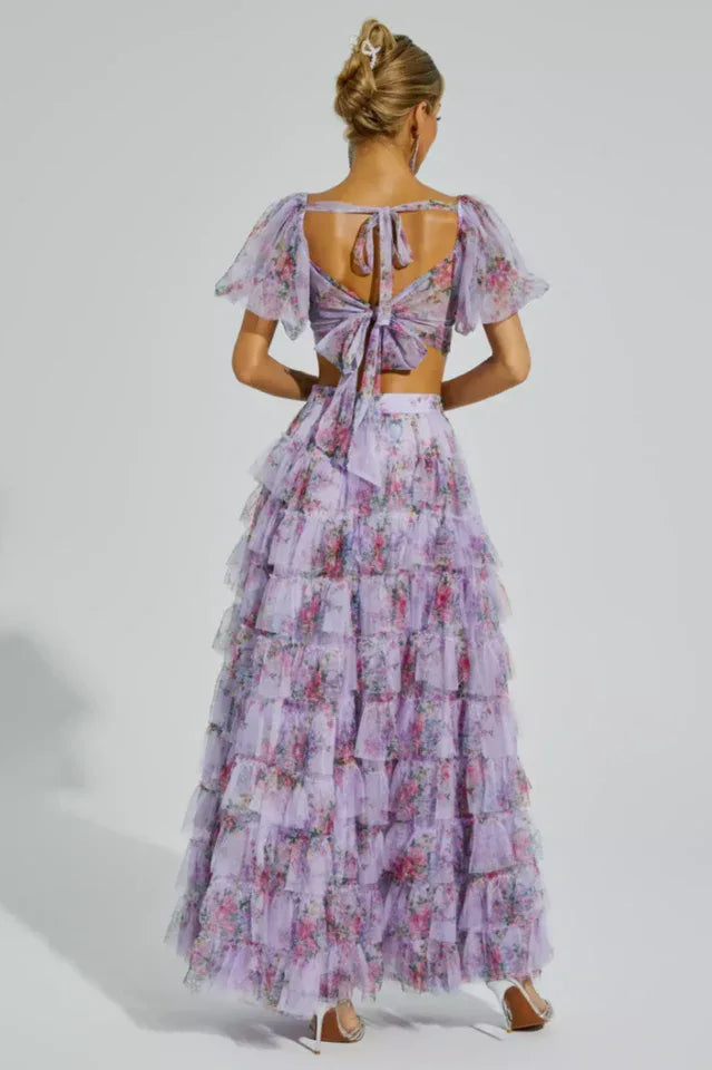 Back view of a floral print two-piece set with a bow tie detail on the crop top.