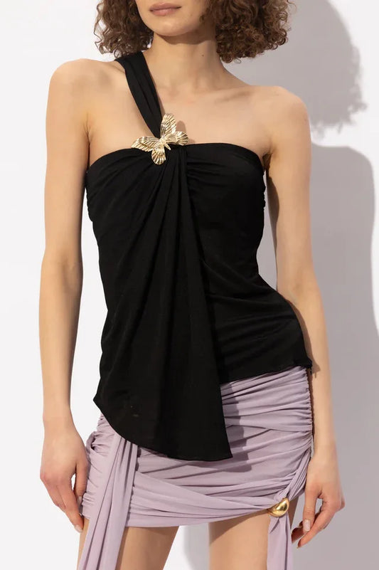 Black one-shoulder draped top with butterfly detail worn by a model
