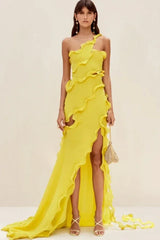 Model wearing a bright yellow one-shoulder chiffon gown with ruffled detailing and a high slit, showcasing the dress from the front.