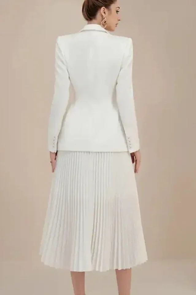 Woman in a white pleated skirt suit from the back