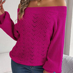 Close-up of a woman wearing a fuchsia off-the-shoulder knit sweater, showing the detail of the knit pattern.