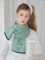 Model wearing a green and white striped knit scarf and white t-shirt.