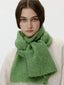 Model wearing a cream sweatshirt and a thick green knit scarf wrapped around her neck, front view.