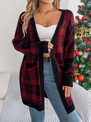 Woman wearing a red and black plaid longline knit cardigan with an open front and pockets.