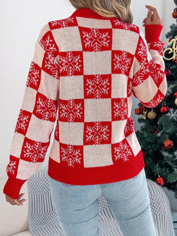 Back view of a woman wearing a red and white checkered snowflake print knit sweater.