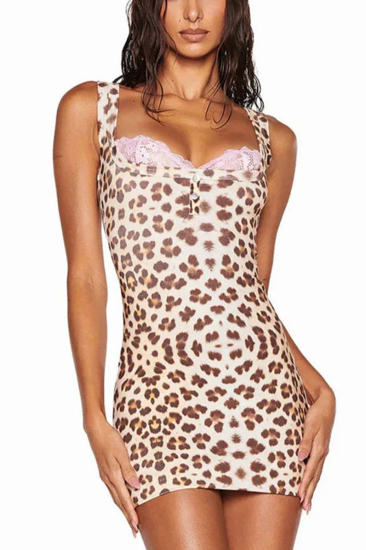 Close-up of a leopard print mini dress with pink lace trim