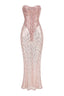 Pink sequined strapless gown with a sheer overlay.