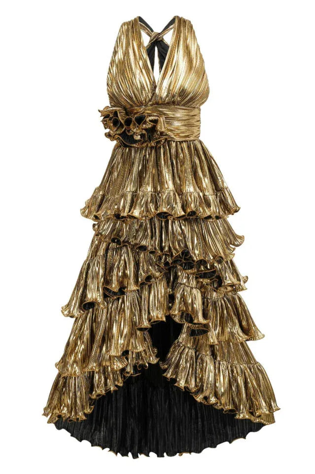 Front view of a gold metallic tiered ruffle halter dress with a cinched waist and ruffled floral detail.