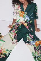 Close-up of a model wearing a floral print two-piece set.