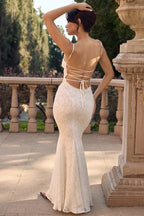 Back view of a woman in a white lace mermaid wedding dress with spaghetti straps and a low back with criss-cross ties.