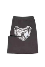 A grey graphic print midi skirt with cut-out details and a tie detail, shown flat against a white background.