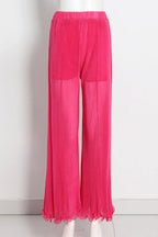 pink pleated wide-leg pants displayed on a mannequin