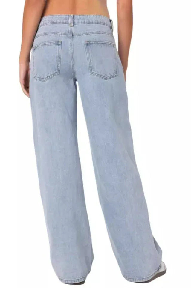 Back view of light wash wide leg jeans worn by a woman