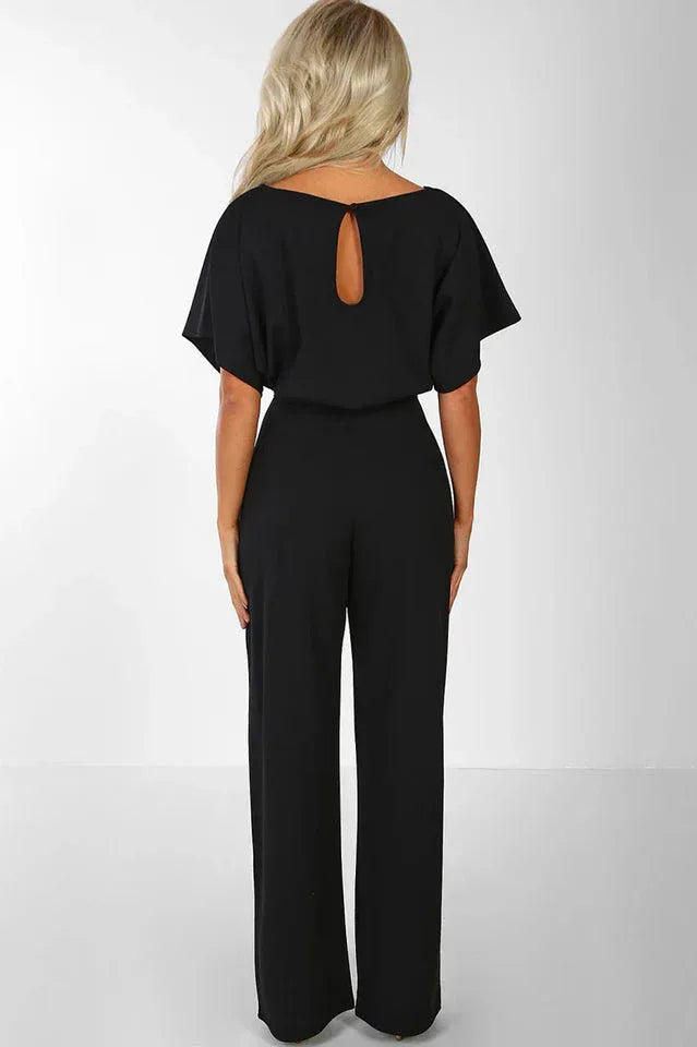 Back view of a woman in a black wide leg jumpsuit with a keyhole detail Secondary image