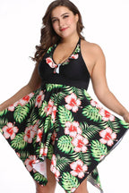 Plus-size women's black floral print halter neck one-piece swimsuit with skirt overlay, front view